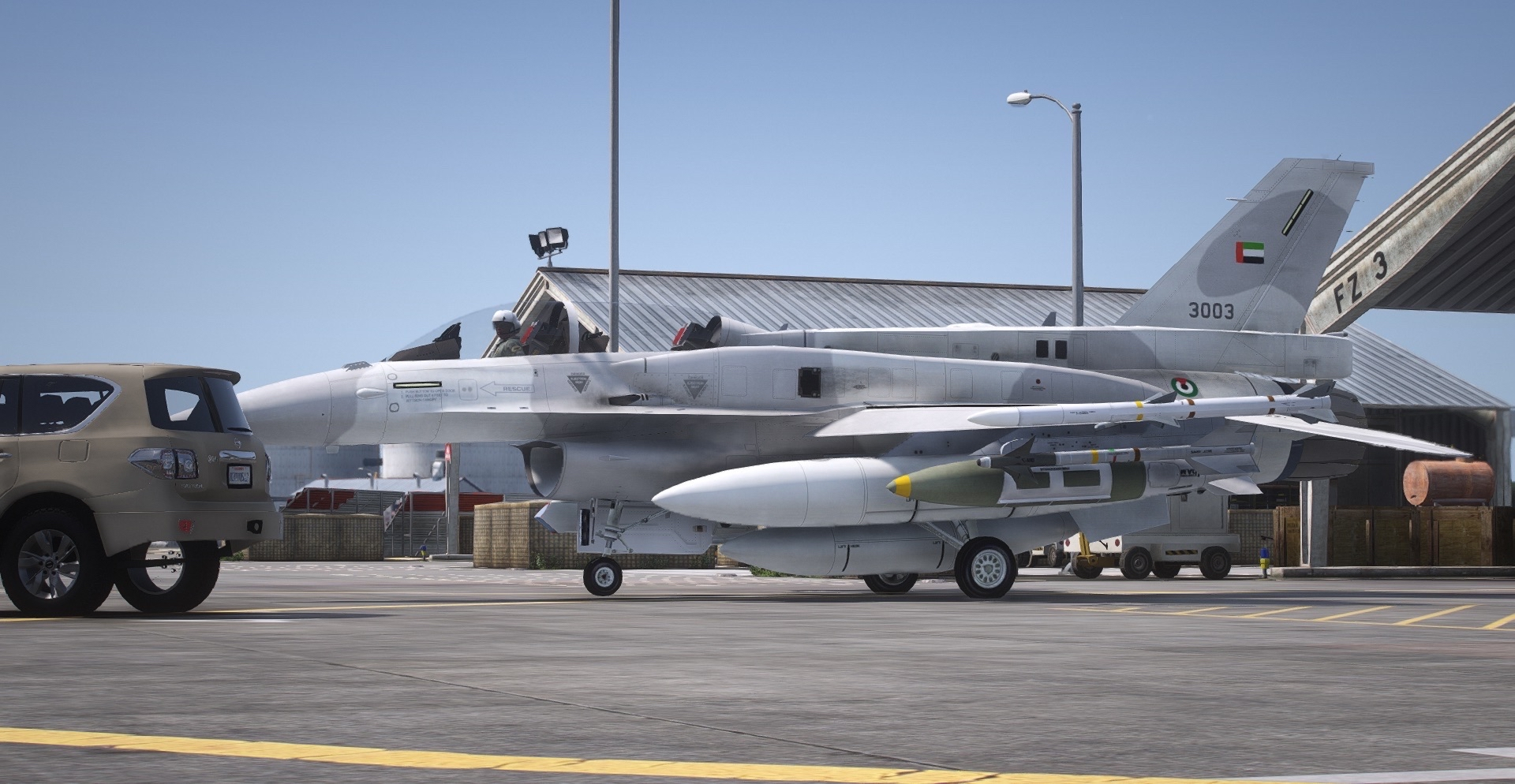 F-16 Fighting Falcon with UAE livery parked at military airbase hangar on MCS FiveM server