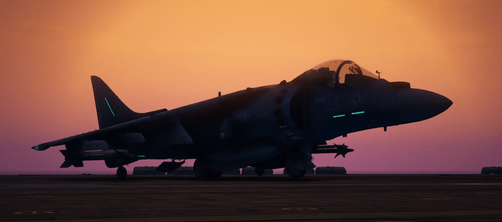 AV-8B Harrier II in silhouette on the deck under a violet and orange sunset on the MCS FiveM server